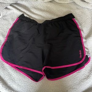Black and pink Reebok breast cancer awareness shorts